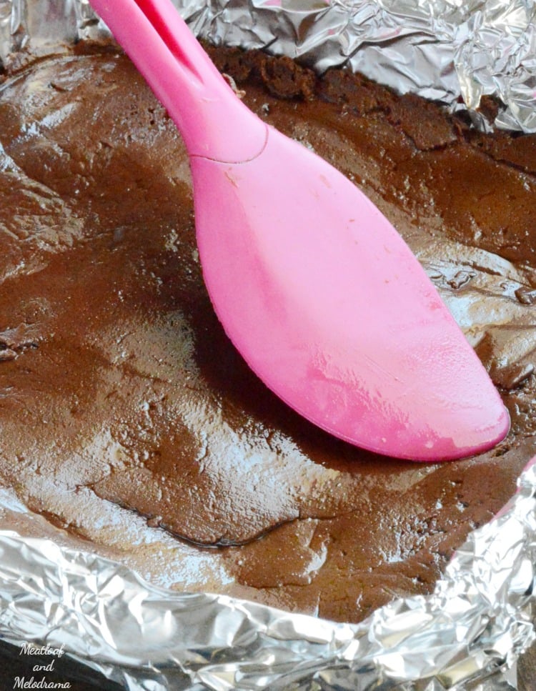 spread fudge mixture into foil lined pan with spatula