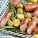 sheet pan smoked sausage dinner with potatoes and green beans