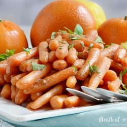 orange ginger glazed carrots on platter