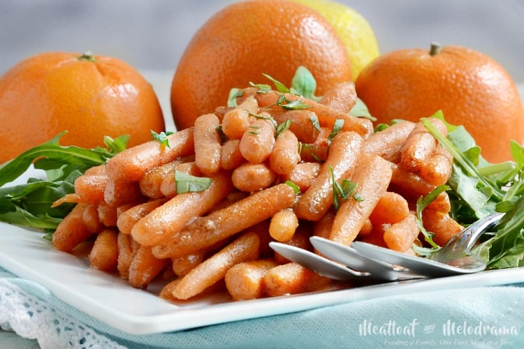 orange ginger glazed carrots on platter