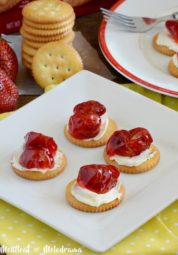 ritz crackers with strawberry pie filling and cream cheese
