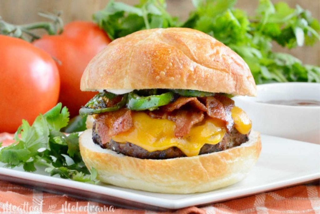 jalapeno bacon cheeseburger on a white plate