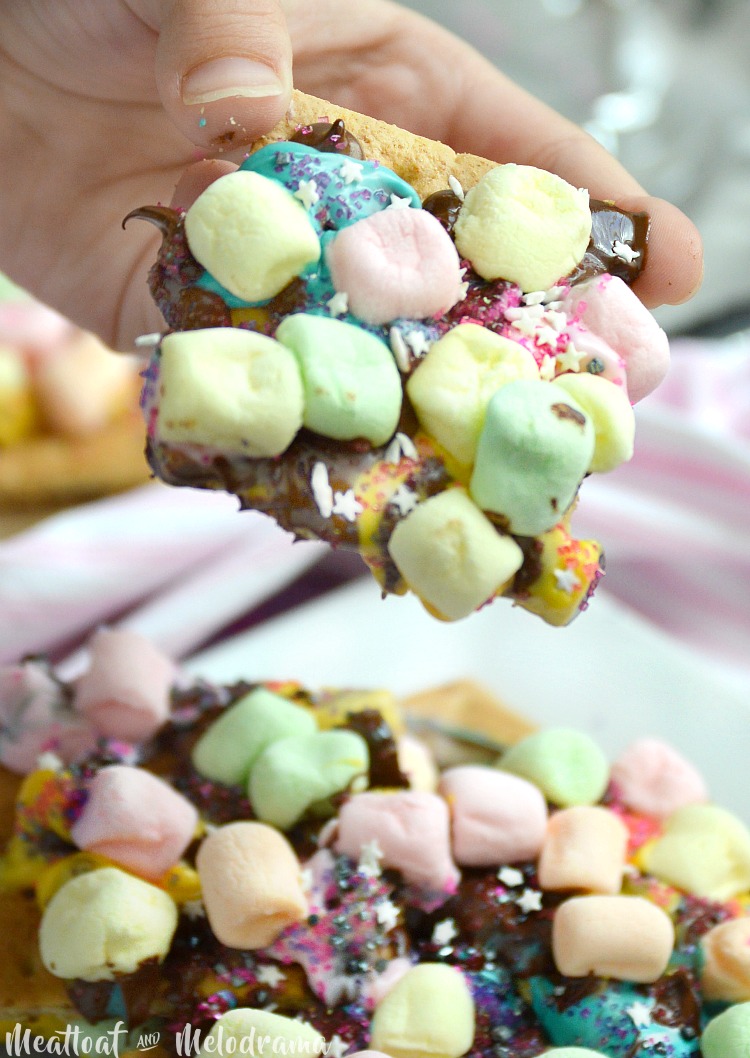 easy unicorn s'mores bars with marshmallows, candy stars and candy melts