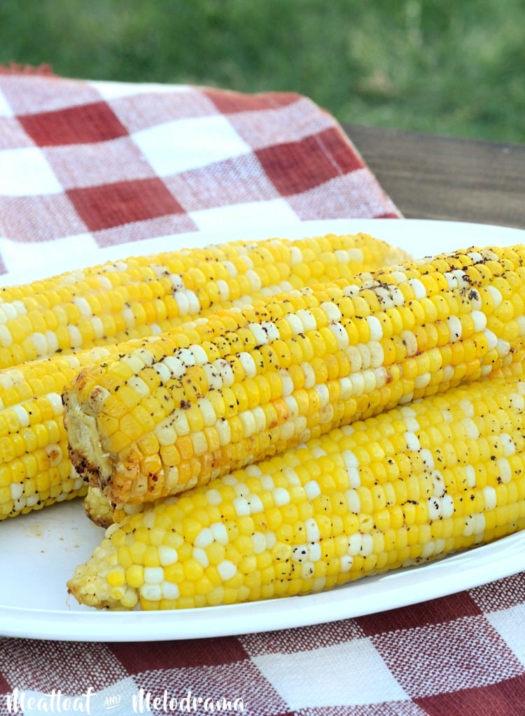 platter of foil grilled corn on the cob