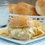 crock pot salsa verde chicken sliders on plate with chips