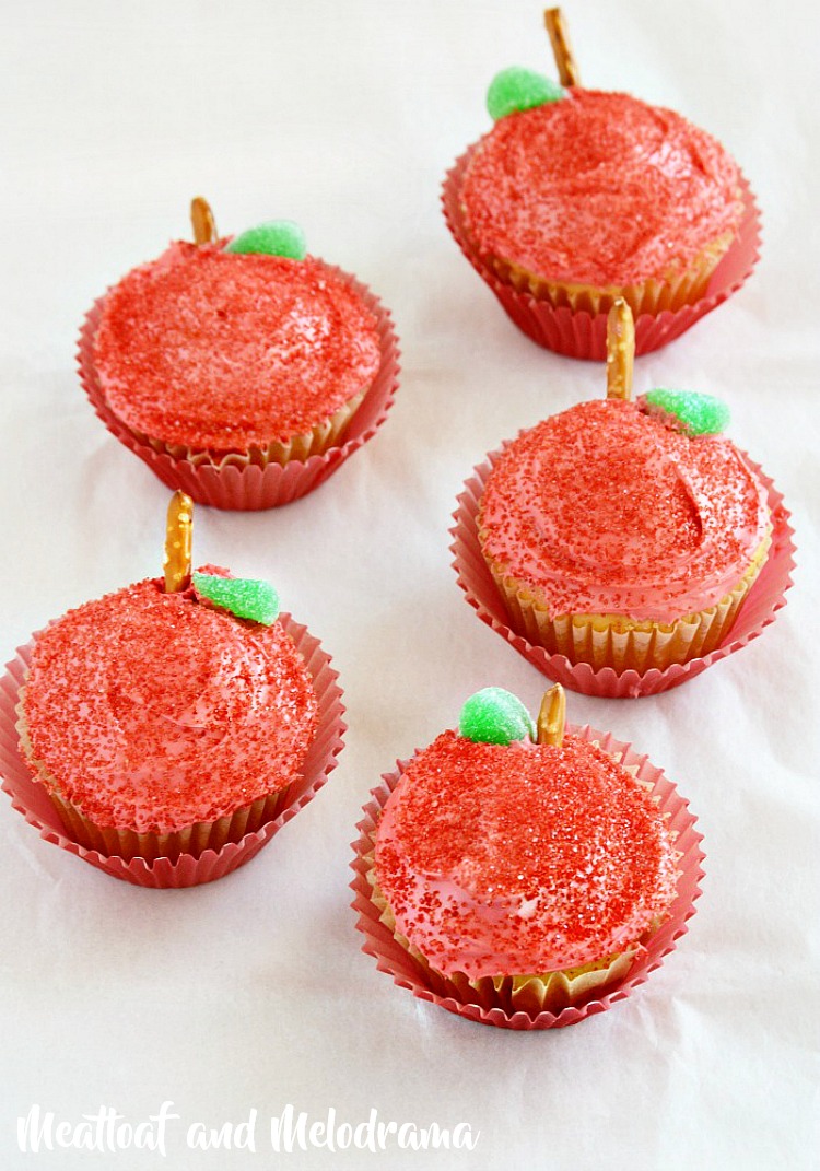 back to school apple cupcakes with pretzel stems and red frosting