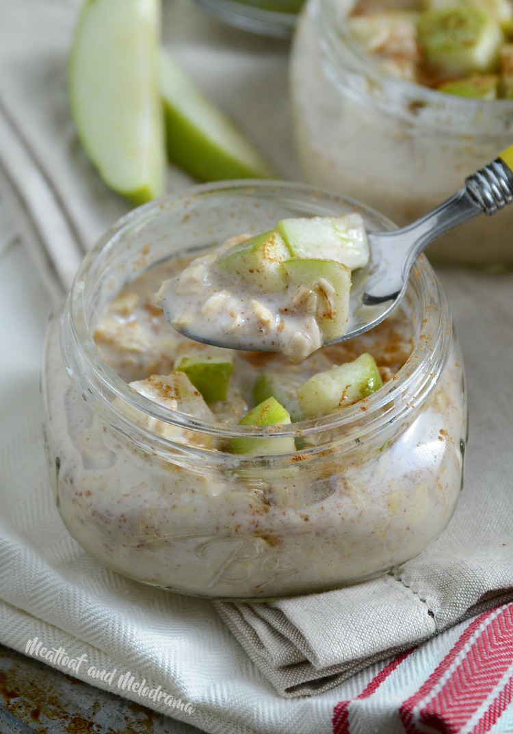 cinnamon brown sugar overnight oats on spoon with apples