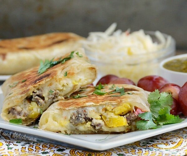 crispy salsa verde breakfast burritos with sausage eggs and peppers