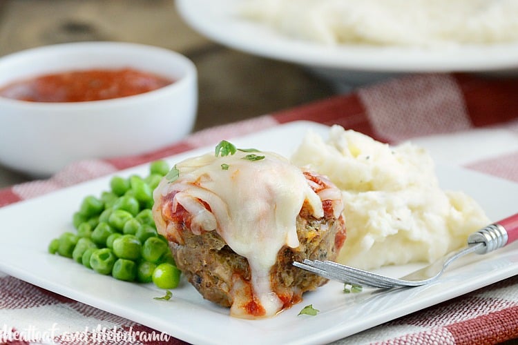 Italian meatloaf muffins with marinara sauce and provolone cheese on a plate