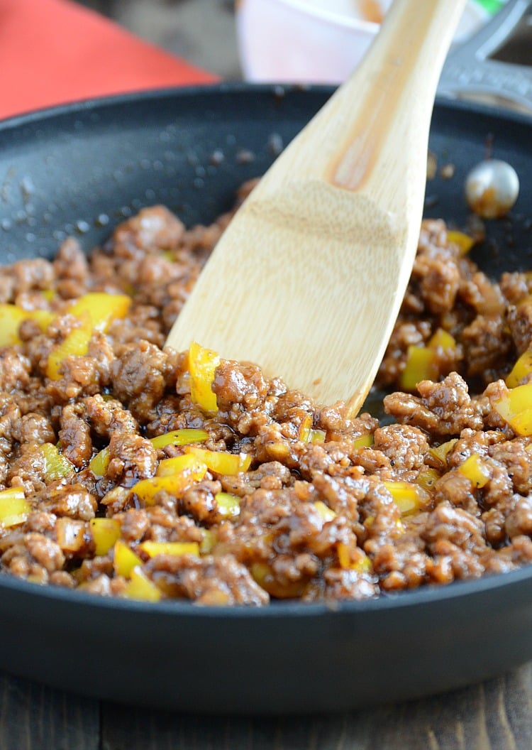 open faced sloppy joes with yellow peppers in skillet