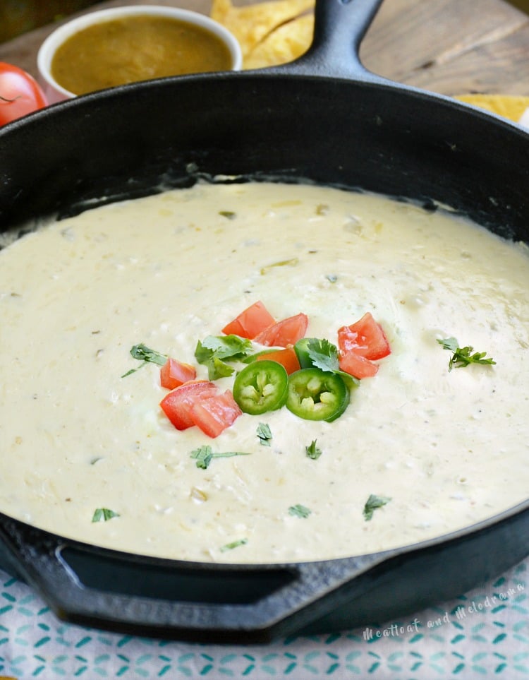 salsa verde white queso dip in cast iron skillet