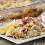 easy baked reuben casserole on a plate with pickles