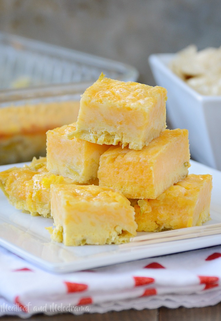 green chile cheese squares stacked on plate