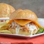 crock pot honey buffalo chicken sliders with ranch dressing and celery sticks