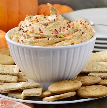 pumpkin pie dessert dip with gingersnaps and graham crackers in a bowl