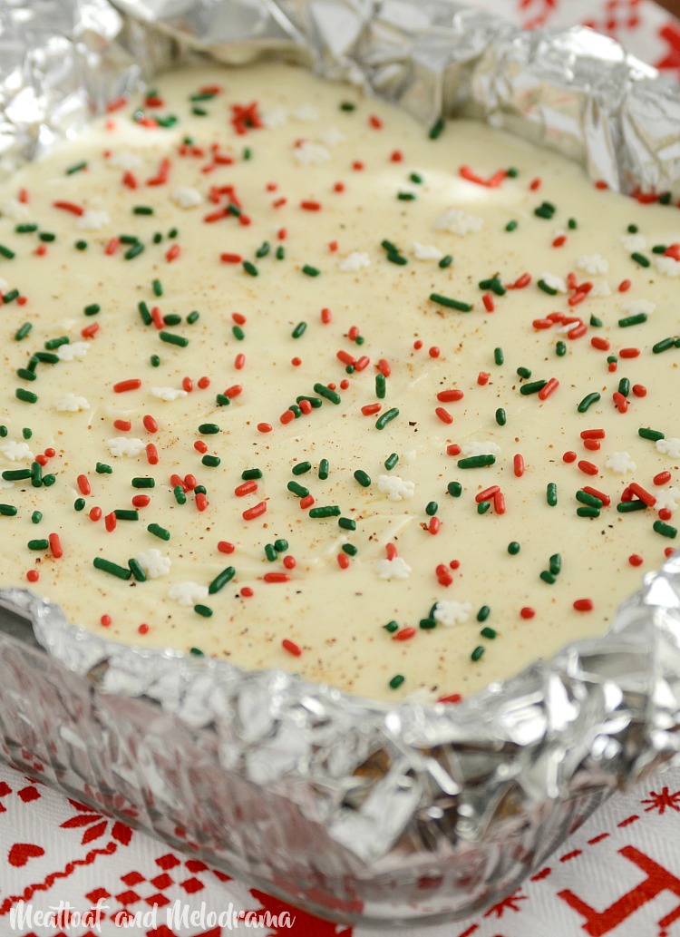 fantasy eggnog fudge with green and red sprinkles in pan 