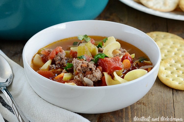 ground beef noodle soup in white bowl