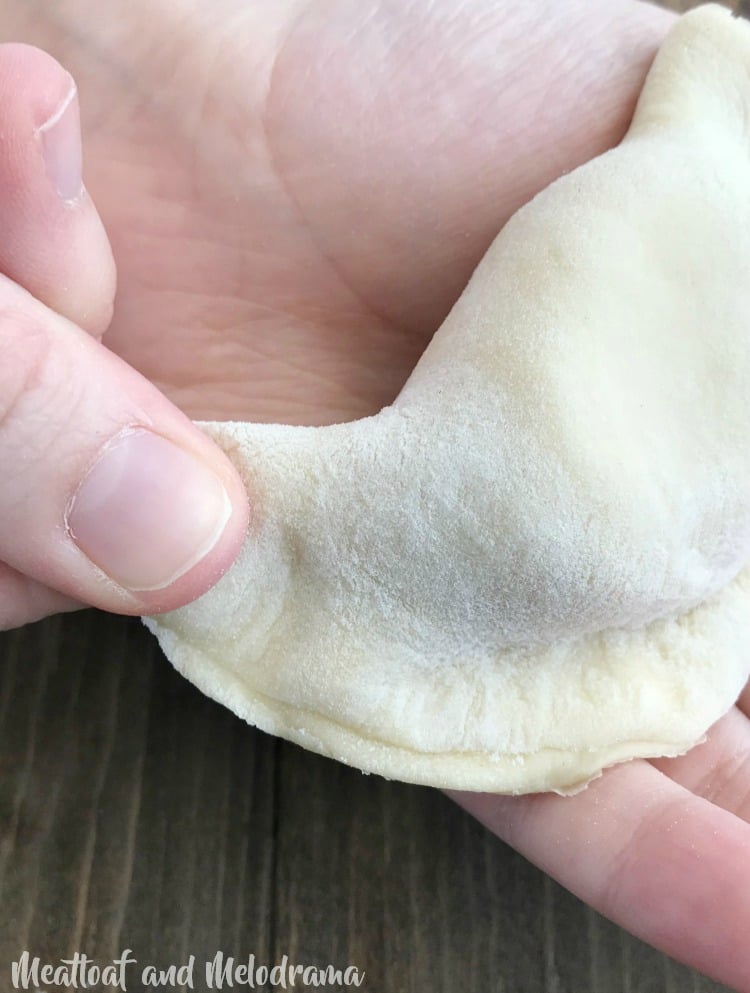 pinch homemade cheddar potato pierogi dough closed