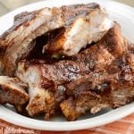 instant pot baby back ribs with bbq sauce on white platter