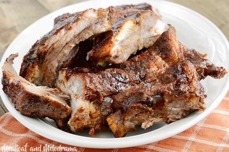 instant pot baby back ribs with bbq sauce on white platter