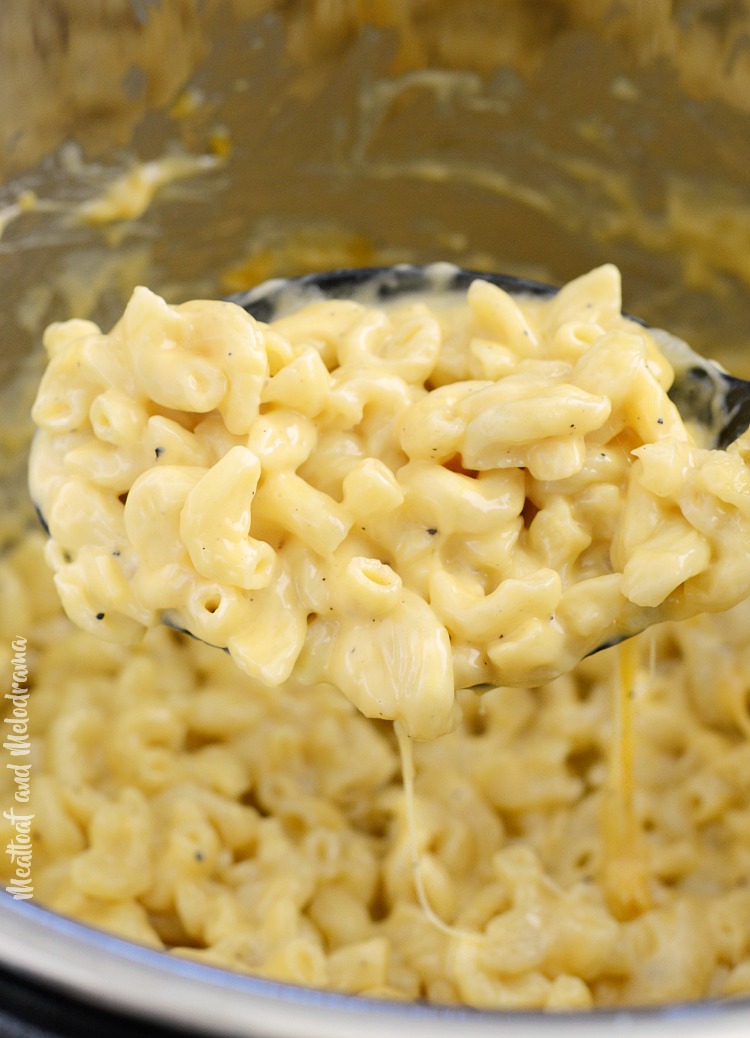 creamy instant pot mac and cheese on spoon