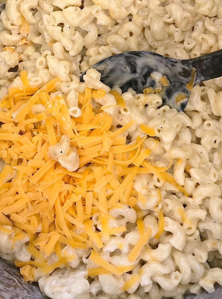 stir in cheese and cream with macaroni for instant pot mac and cheese