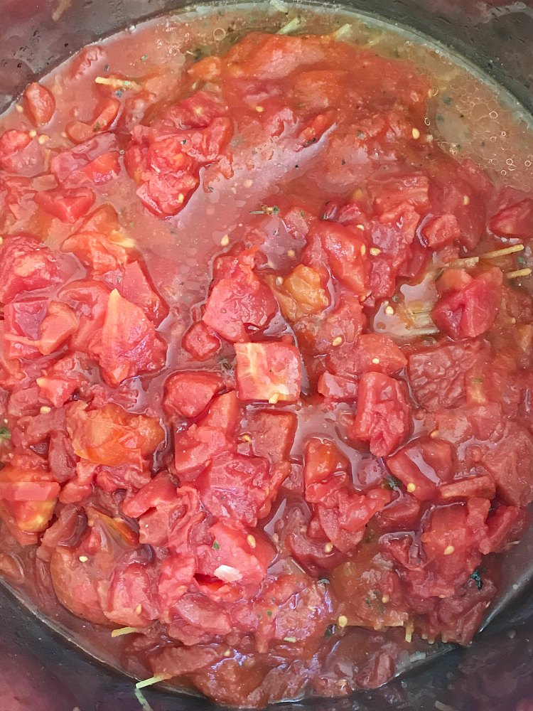 instant pot spaghetti and meat sauce with diced tomatoes in pot