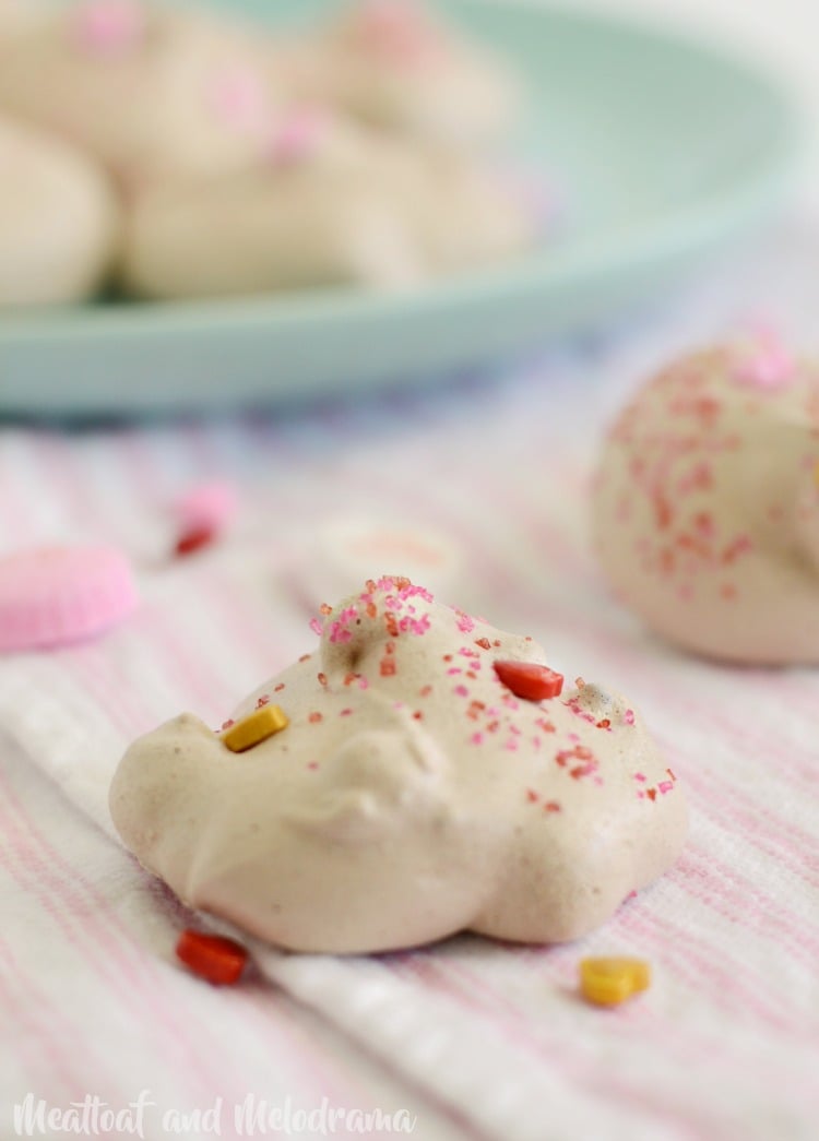double chocolate meringue cookies with candy hears and sprinkles for valentine's day