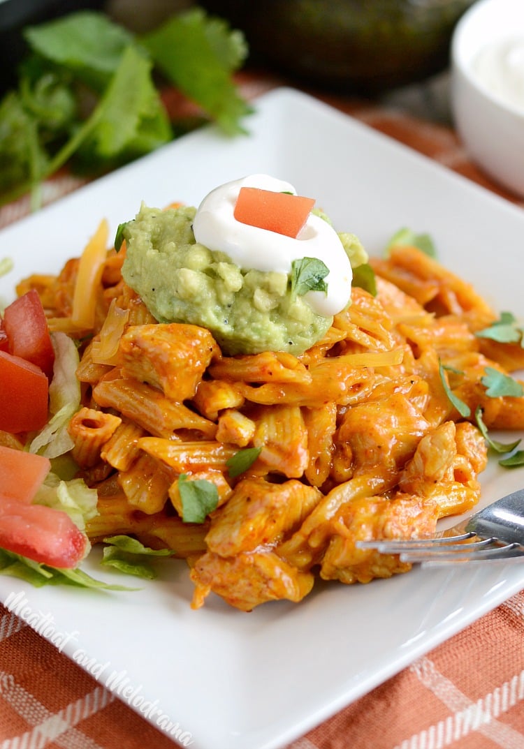 instant pot chicken enchilada pasta with sour cream and guacamole