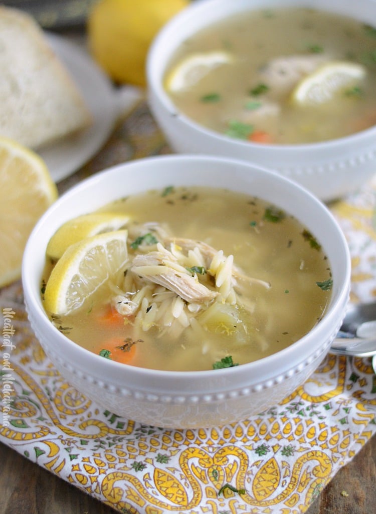 instant pot lemon chicken orzo soup with carrots and celery and lemon slices