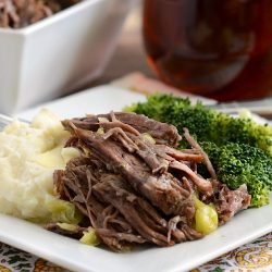 instant pot mississippi chuck roast on plate with mashed potatoes and broccoli