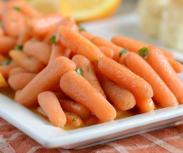 instant pot orange ginger carrots on white platter