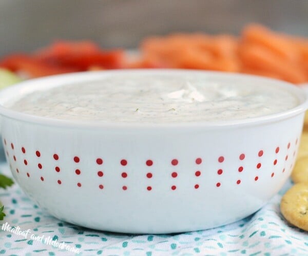 creamy dill dip recipe in red and white bowl