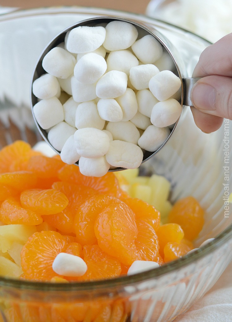 add marshmallows to easy ambrosia fruit salad