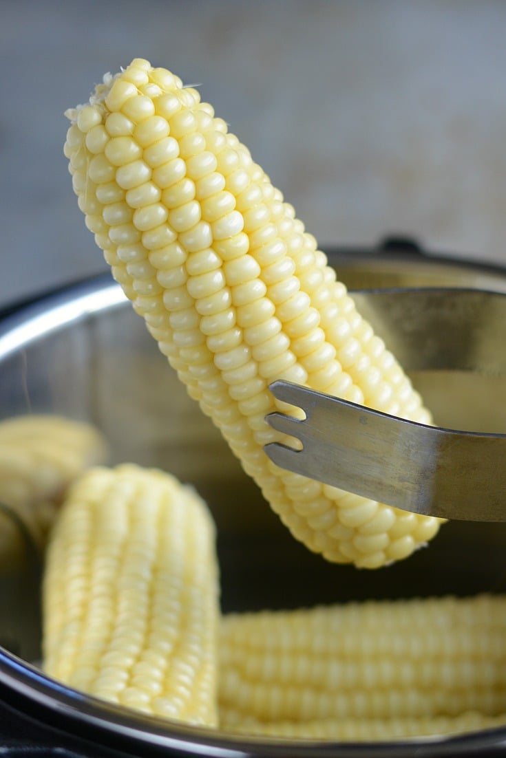 instant pot corn on the cob in tongs