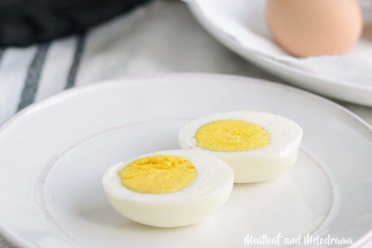 instant pot hard boiled eggs sliced on a plate