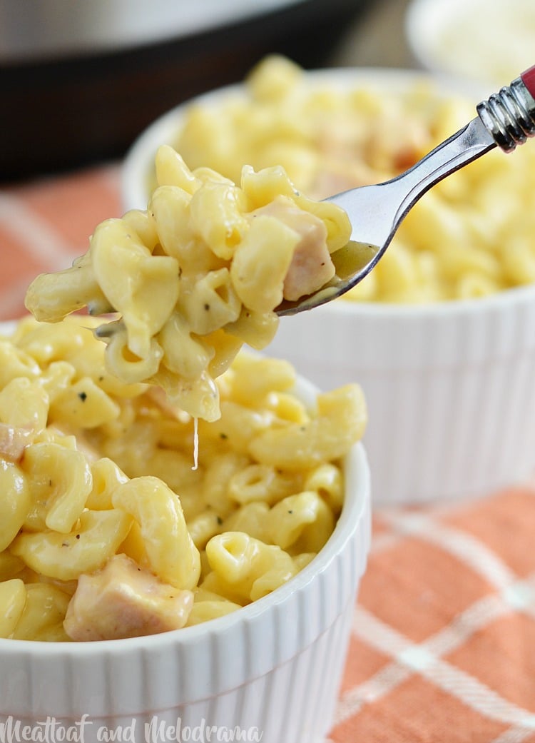 instant pot mac and cheese with ham in fork