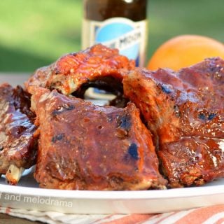 instant pot beer ribs with orange valencia beer on a platter