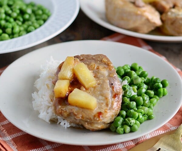 instant pot hawaiian bbq pork chops on plate with rice and peas