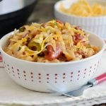 instant pot macaroni beef casserole with cheese in white bowl