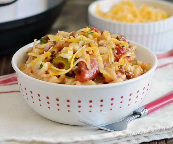 instant pot macaroni beef casserole with cheese in white bowl