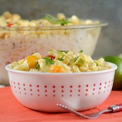 instant pot southwest macaroni salad in red and white bowl
