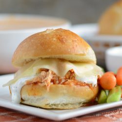 instant pot buffalo chicken sliders with ranch and provolone cheese on plate