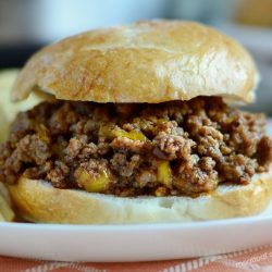 instant pot sloppy joes on a plate with potato chips