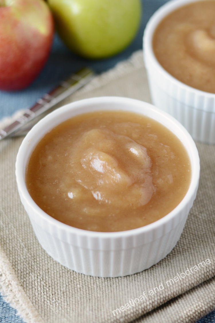 homemade instant pot applesauce in white bowl with apples