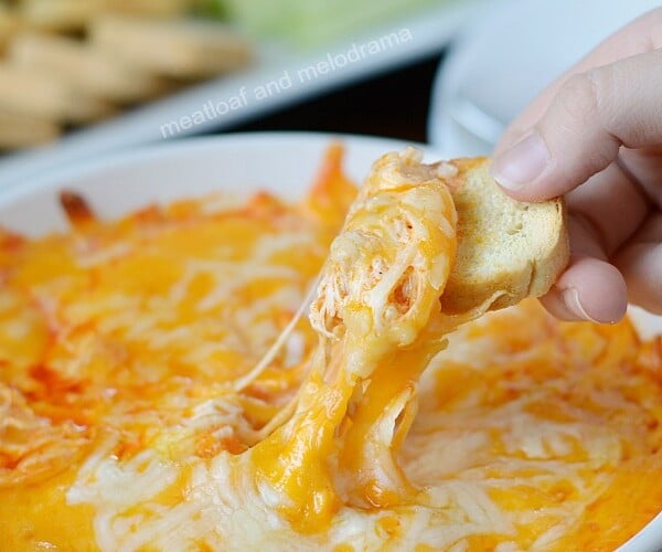 cheesy instant pot buffalo chicken dip on bread rounds
