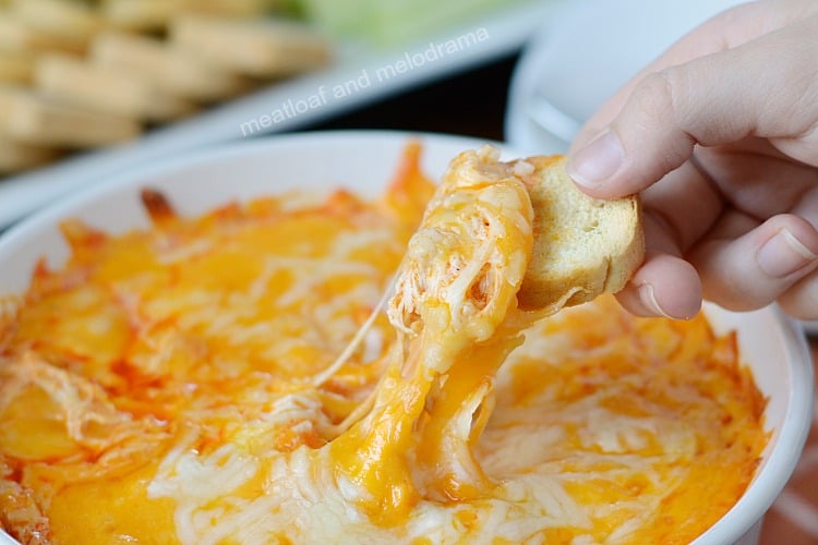 cheesy instant pot buffalo chicken dip on bread rounds