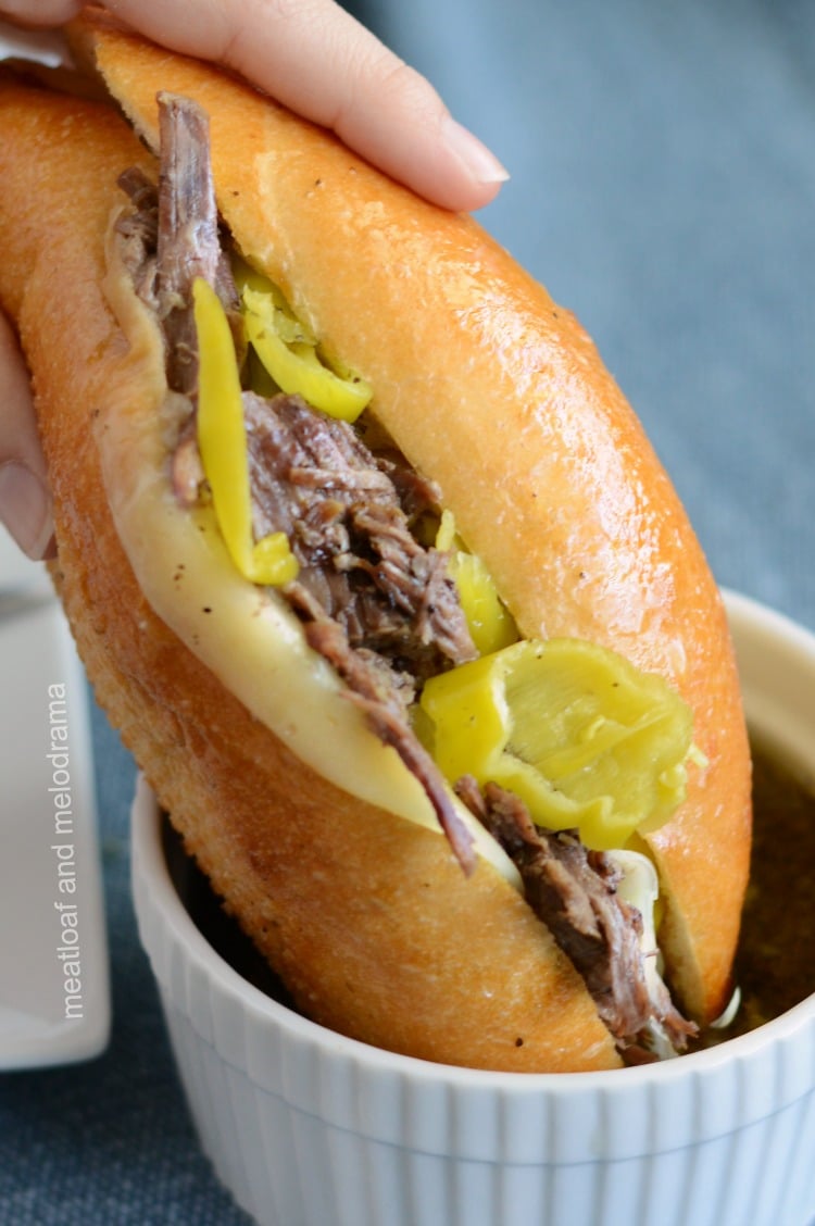 dip instant pot italian beef sandwiches in au jus