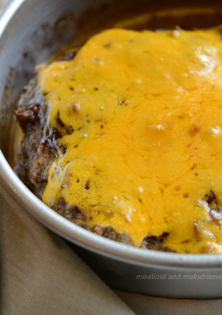 instant pot meatloaf with cheddar cheese and bbq sauce in cake pan