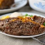 instant pot meatloaf with cheddar cheese and bbq sauce on plate